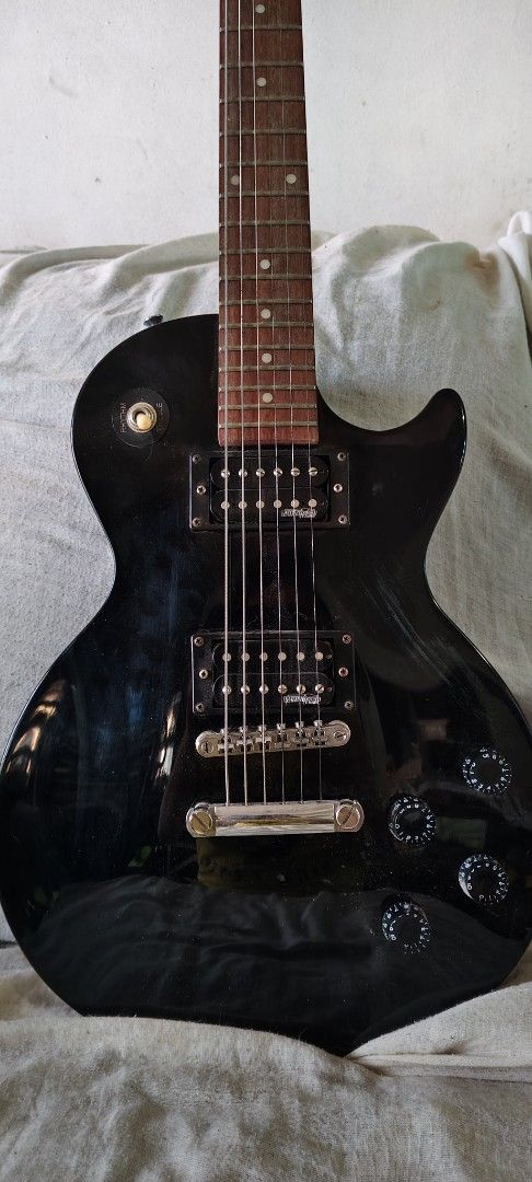 Epiphone Studio LT Electric Guitar (Category: Musical Instruments) located in Paranaque City. Submitted by skylonequinox (Listing ID 1437933082, Image 2). Description: Currently has gauge 13 strings because it was previouslyused for drop G#/drop A tunings, please have it set up with your luthier to your preference. RFS: Tone doesn't meet my preferences.