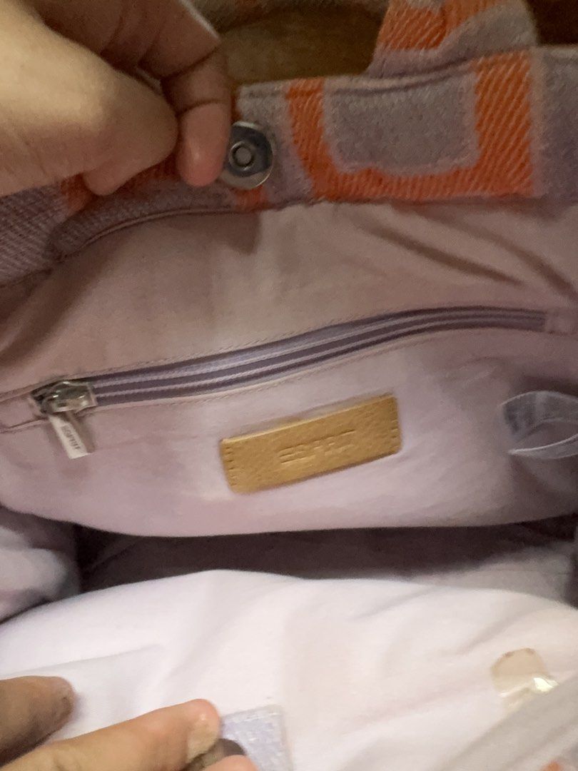 Esprit Geometric Pattern Tote Bag (Category: Tote Bags) located in Cainta. Submitted by efimoroll (Listing ID 1437761252, Image 2). Description: 👜 original Esprit tote bag perfect for summer or daily use - Unique geometric orange and purple pattern - Sturdy handles with leather accents - Magnetic snap closure .