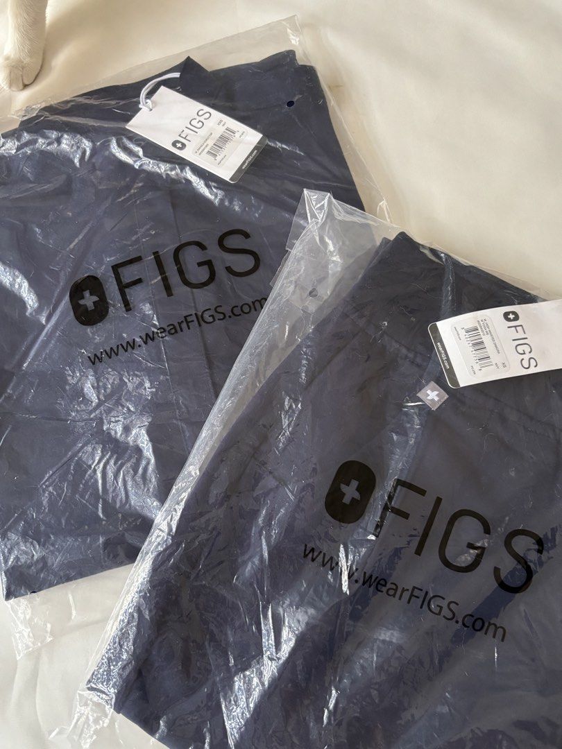 FIGS Scrubs (Category: Sets or Coordinates) located in Quezon City. Submitted by dan.bam (Listing ID 1437798801, Image 1). Description: - Brand new navy blue FIGS scrubs Top: oversized rafaela xxs on tag Bottoms: Zamora joggers xs on tag - Still in original packaging - Tags attached - Brand name and website visible - Two sets available.