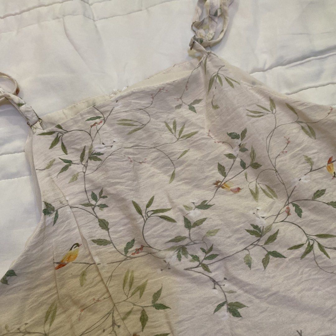 Floral Print Spaghetti Strap Dress (Category: Dresses) located in Dagupan City. Submitted by sol.bi (Listing ID 1437911709, Image 2). Description: - Floral print with birds and leaves - Spaghetti straps - Relaxed fit - Light color - Knee-length - Lightweight fabric worn once lang .