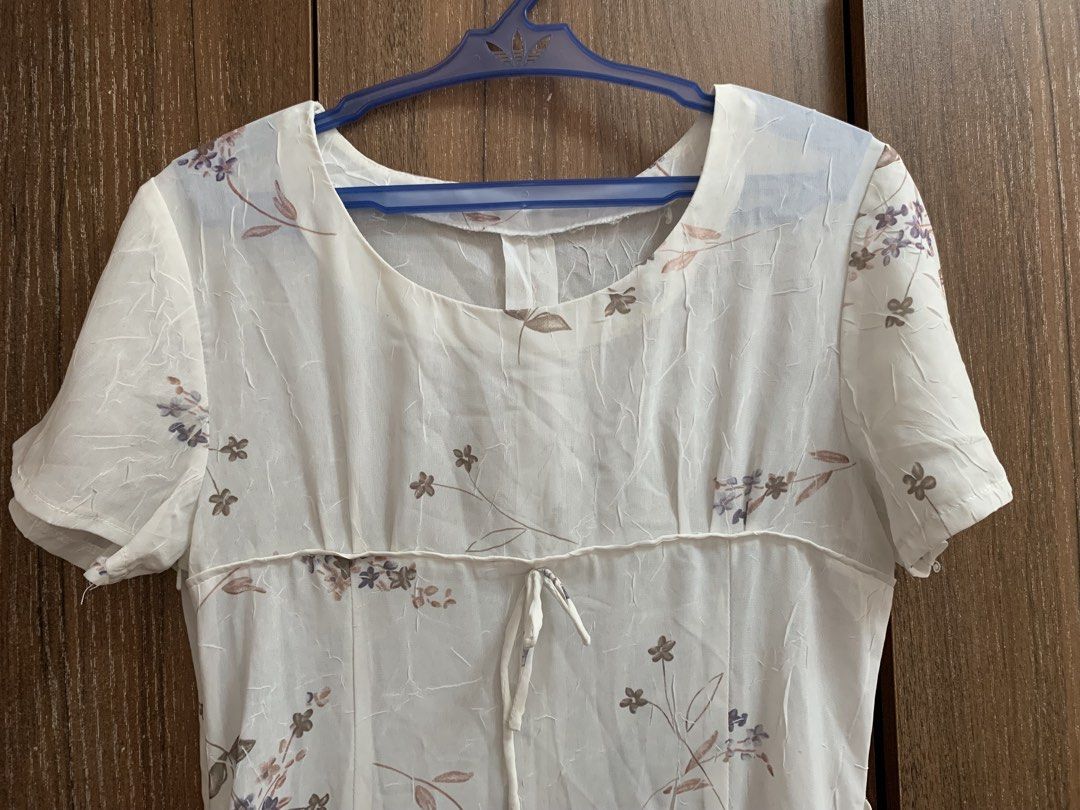 Floral White Dress (Category: Dresses) located in Imus. Submitted by kael.finds (Listing ID 1437781941, Image 1). Description: Bust: 31 inches Length: 48 1/2 Flaw: minimal dents (see last pic) Fabric is sheer (best to wear with sando dress) ☑️MOP: GCash ☑️Payment first policy ☑️The buyer will shoulder the delivery fee. ☑️No meetups. ☑️No COD/COP ☑️Courier: J&T, Lalamove.