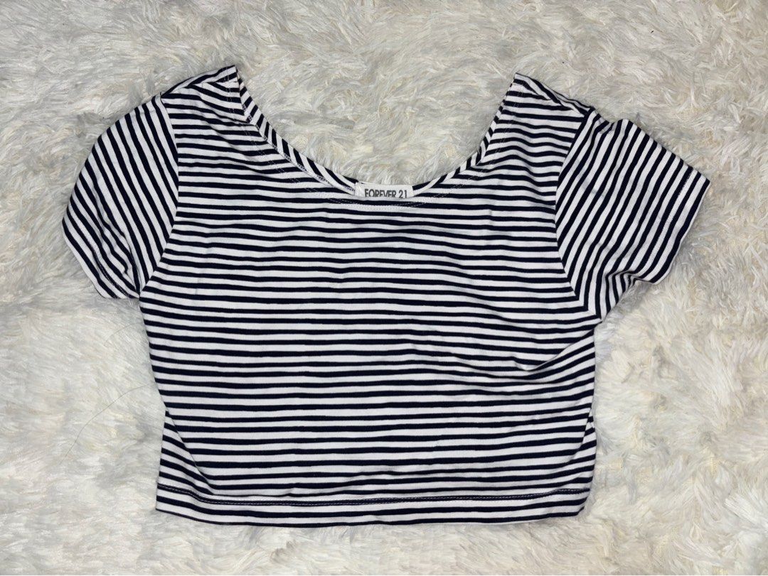 Forever 21 Striped Top - Size M (Category: Sleeveless) located in Angono. Submitted by kalidope (Listing ID 1437921455, Image 1). Description: Top from Forever 21 features a classic striped design. It has a round neckline and short sleeves. The size is M. Made in Bangladesh. The top is perfect for casual wear and can be paired with jeans or skirts. It is a versatile piece for any wardrobe..