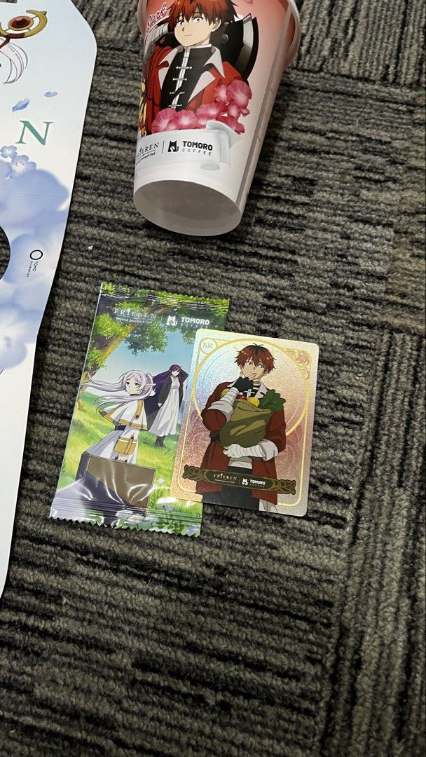 Frieren x Tomoro (Category: Fan Merchandise) located in Taytay. Submitted by shoptosustain (Listing ID 1437876135, Image 2). Description: ALL for 200 don't worry hugas po yung cup and wala po akong contagious disease ☺️ RFS: not a merch girly pero anime fan.