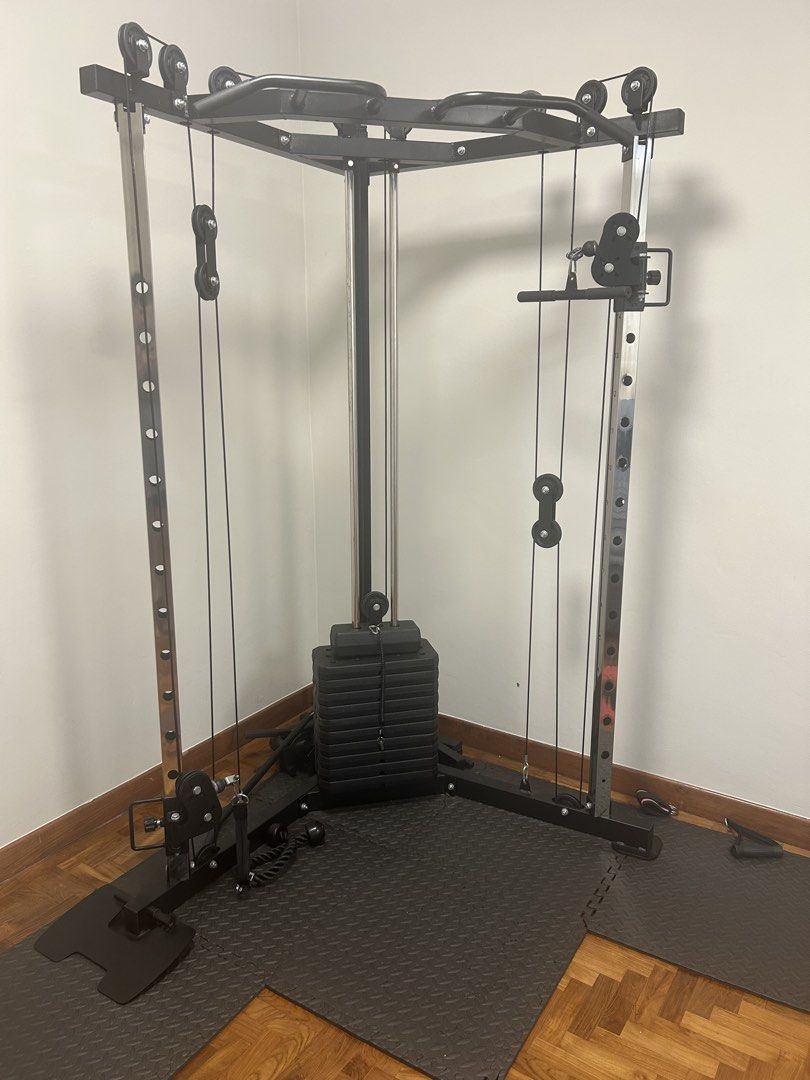 Functional Trainer Cable Machine (Category: Cardio & Fitness Machines) located in Singapore. Submitted by elijahgar53259 (Listing ID 1437767441, Image 1). Description: - High-quality functional trainer 72kg - Pick up, can help dismantle. - Includes various attachments - Perfect for home full-body workouts - Weights included.