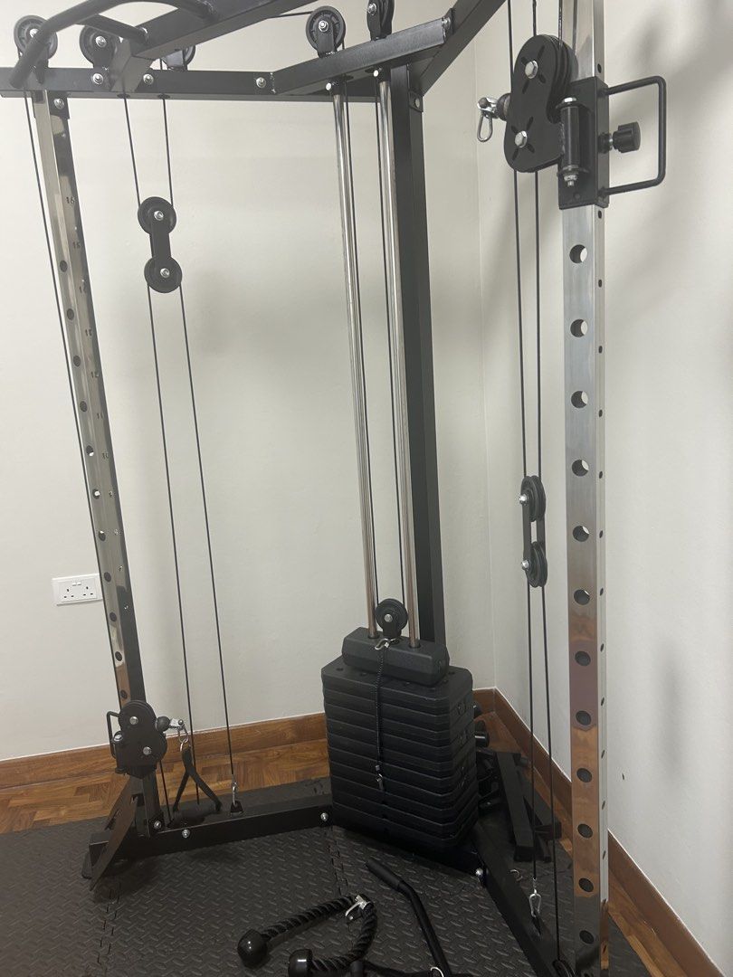 Functional Trainer Cable Machine (Category: Cardio & Fitness Machines) located in Singapore. Submitted by elijahgar53259 (Listing ID 1437767441, Image 3). Description: - High-quality functional trainer 72kg - Pick up, can help dismantle. - Includes various attachments - Perfect for home full-body workouts - Weights included.