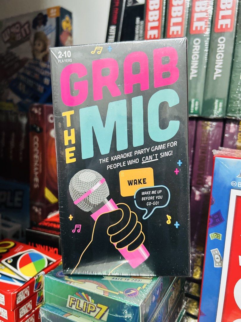 Grab the Mic Karaoke Party Game (Category: Microphones) located in Quezon City. Submitted by playboxph (Listing ID 1437888733, Image 1). Description: - Grab the Mic: The hilarious party game! - Designed for people who can't sing. - For 2-10 players. - Features a fun microphone graphic. - Perfect for game nights and gatherings..