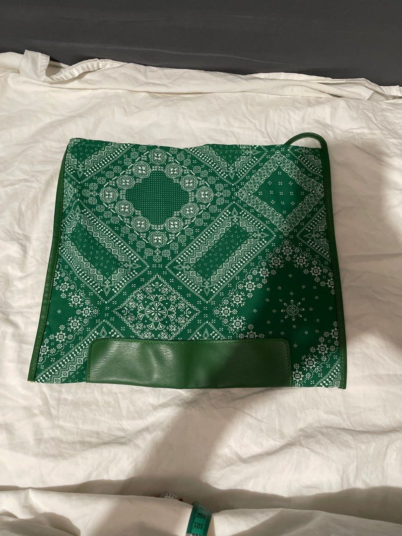 Green Bandana Tote Bag (Category: Tote Bags) located in Makati City. Submitted by afterpiece (Listing ID 1437914081, Image 2). Description: Green tote bag with bandana print. Features a leather-like bottom and straps. Spacious and stylish for everyday use..