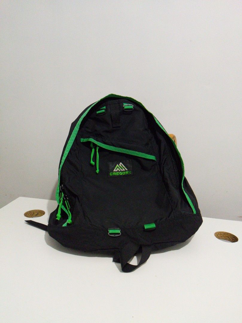 Gregory Backpack Black and Green (Category: Backpacks) located in Santa Cruz. Submitted by earthangelo (Listing ID 1437881844, Image 2). Description: - Black Gregory backpack - Green accents - Adjustable straps - Multiple compartments - Green interior - Top handle - Two shoulder straps - Two D-rings on the back - Green zippers.
