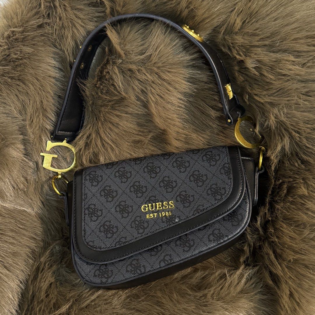 GUESS SADDLE BAG (Category: Luxury Bags & Wallets) located in Davao. Submitted by wisedeer-bcd8 (Listing ID 1437883000, Image 1). Description: good condition, free shipping nationwide .