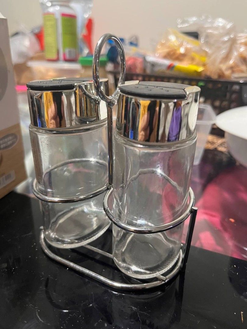 Izumi Glass Spice Jar Set (Category: Food Organization & Storage) located in Manila. Submitted by marygraceyyy (Listing ID 1437787308, Image 2). Description: - Izumi 2-piece spice jar set - Includes metal stand and lids - Clear glass jars - Unused condition - Ideal for spice organization.