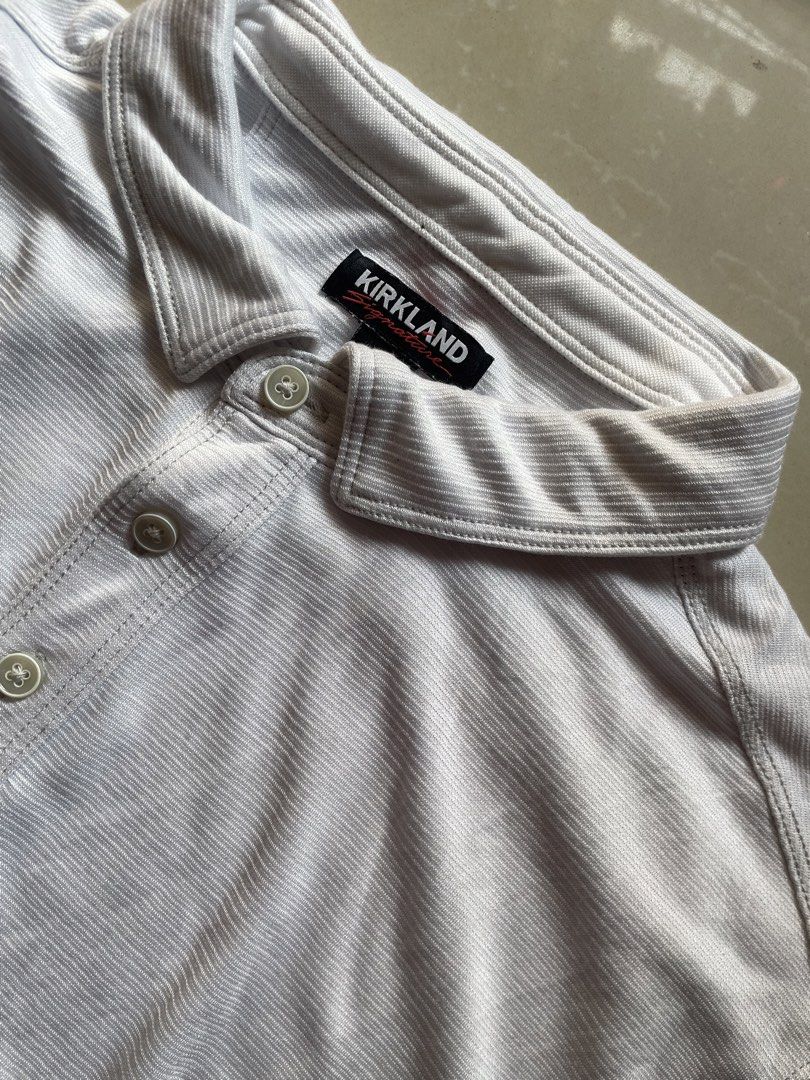 Kirkland Polo Shirt - White (Category: Tshirts & Polo Shirts ) located in Manila. Submitted by cadithrift (Listing ID 1437852971, Image 2). Description: - [ ] Kirkland White Polo shirt 23x 27 No issue.