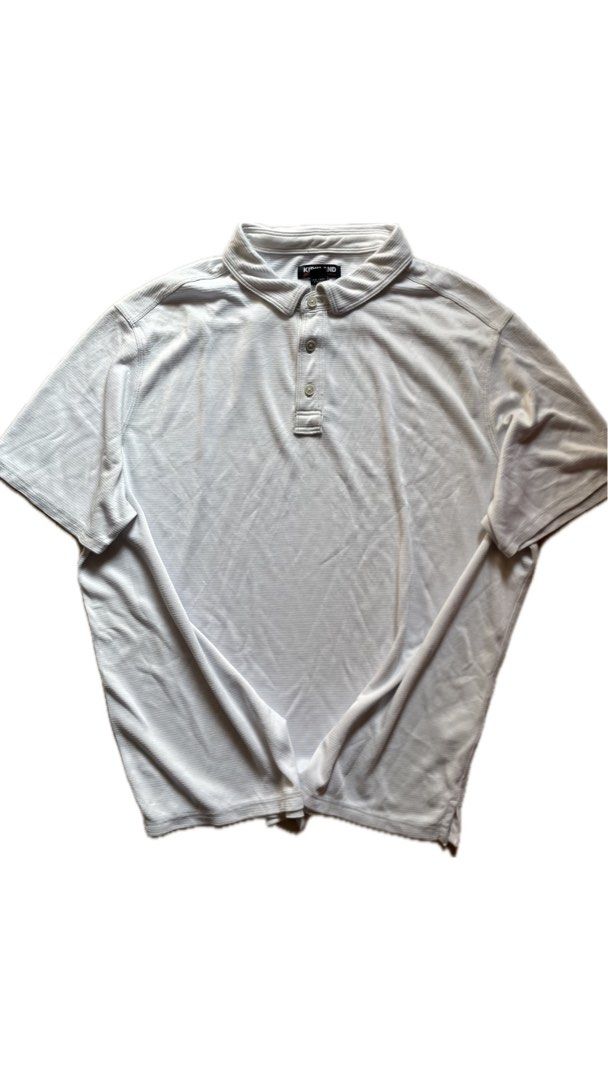 Kirkland Polo Shirt - White (Category: Tshirts & Polo Shirts ) located in Manila. Submitted by cadithrift (Listing ID 1437852971, Image 1). Description: - [ ] Kirkland White Polo shirt 23x 27 No issue.