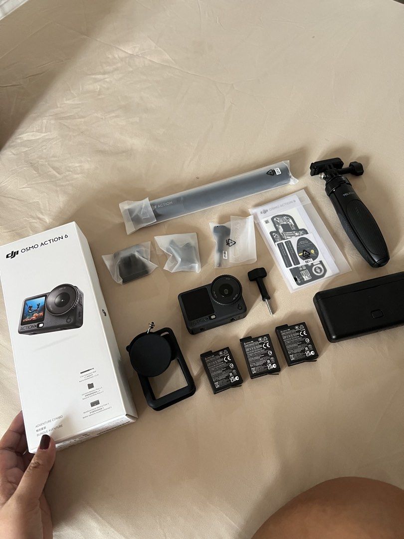 Lady owned!! DJI Osmo Action 6 Adventure Combo (Category: Cameras) located in Imus. Submitted by onlyaikofv (Listing ID 1437769256, Image 2). Description: - DJI Osmo Action 6 Adventure Combo Includes: - Camera - Three Batteries - Charging Case - Selfie Stick - Tripod - Various Accessories - Comes with original box and documentation - Ready to use for your adventures! Add ons: -telesin tripod -silicone case -camera leather case 100% smooth. No den