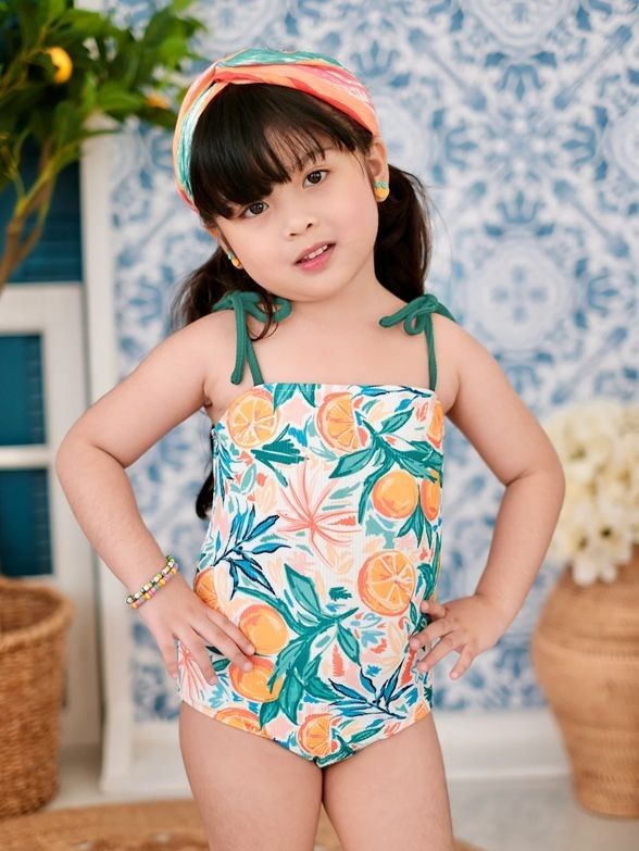 Laila & Lyra Orange Print Bodysuit (Category: Babies & Kids Fashion) located in Quezon City. Submitted by bringjoy (Listing ID 1437831168, Image 2). Description: - Brand: Laila & Lyra - Design: Orange print swimsuit - Features: Tie straps, square neckline - For: Kids - Ideal for: Beach or pool days this bodysuit screams summer vibes. can be used as swimsuit, or paired with skirt or denim.