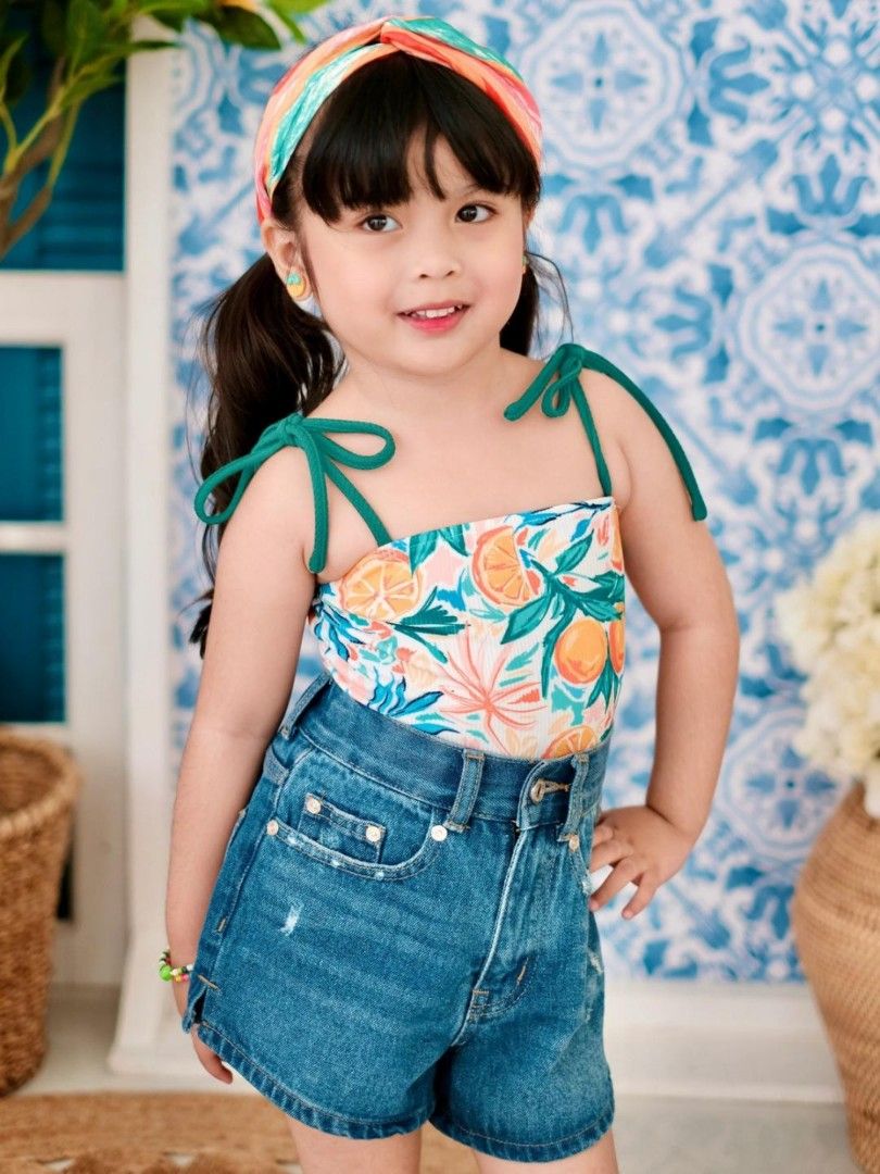 Laila & Lyra Orange Print Bodysuit (Category: Babies & Kids Fashion) located in Quezon City. Submitted by bringjoy (Listing ID 1437831168, Image 3). Description: - Brand: Laila & Lyra - Design: Orange print swimsuit - Features: Tie straps, square neckline - For: Kids - Ideal for: Beach or pool days this bodysuit screams summer vibes. can be used as swimsuit, or paired with skirt or denim.