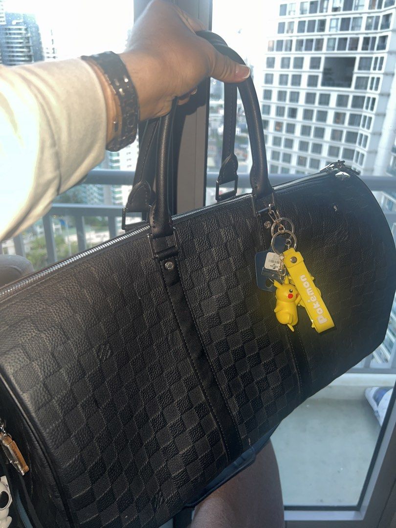 Louis Vuitton Leather Duffle Bag (Category: Luxury Bags & Wallets) located in Manila. Submitted by nokwizy_archive (Listing ID 1437852893, Image 3). Description: Used once to travel the US, down to 15k my tita need funds lang din kase..
