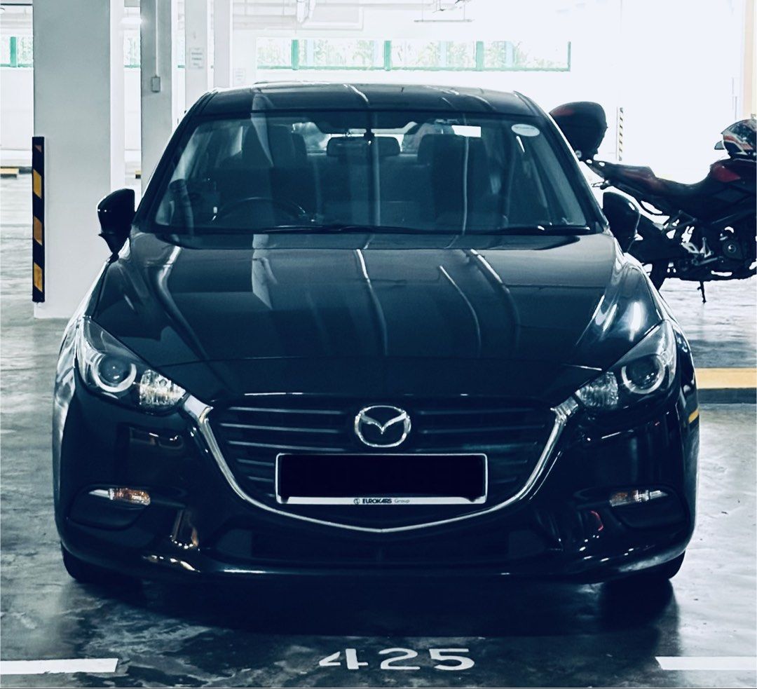 Mazda 3 Sedan 1.5 Deluxe (A) (Category: Used Cars) located in Singapore. Submitted by manasmohsin (Listing ID 1435557729, Image 2). Description: Mazda 3 Sedan (Top Model) | Pristine Condition | Sunroof | Low Mileage * meticulously maintained, accident-free, and handled with care * Low mileage – only 74,000 km driven (just ~4k/year over the last 2 years) * Top variant sedan – comes with sunroof and all premium features * Upgraded infotainment – hi