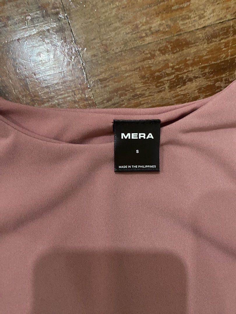 Mera Pink T-shirt - Size S (Category: Shirts) located in Manila. Submitted by boomboomshakataka (Listing ID 1437870059, Image 2). Description: - Pink Mera T-shirt - Size: S - Made in the Philippines - Features: - Round neck - Short sleeves - Fitted silhouette - Brand new with tag.