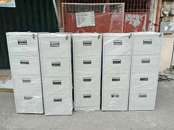 Metal Filing Cabinets - 4 Drawers (Category: Office Furniture & Fixtures) located in Manila. Submitted by jerrymieborda05 (Listing ID 1437920975, Image 1). Description: - Metal filing cabinets - Each cabinet has four drawers - Includes handles - Wrapped in plastic - Perfect for organizing documents - Suitable for office or home use.