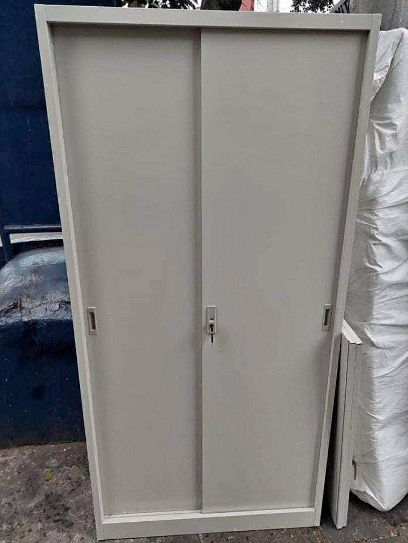 Metal Storage Cabinet with Glass Doors (Category: Shelves, Cabinets & Racks) located in Manila. Submitted by jerrymieborda05 (Listing ID 1437920179, Image 3). Description: - Durable metal storage cabinet - Glass doors - Multiple shelves for organized storage - Ideal for display or storage - Available in various sizes - Perfect for home or office - Includes locking mechanisms.