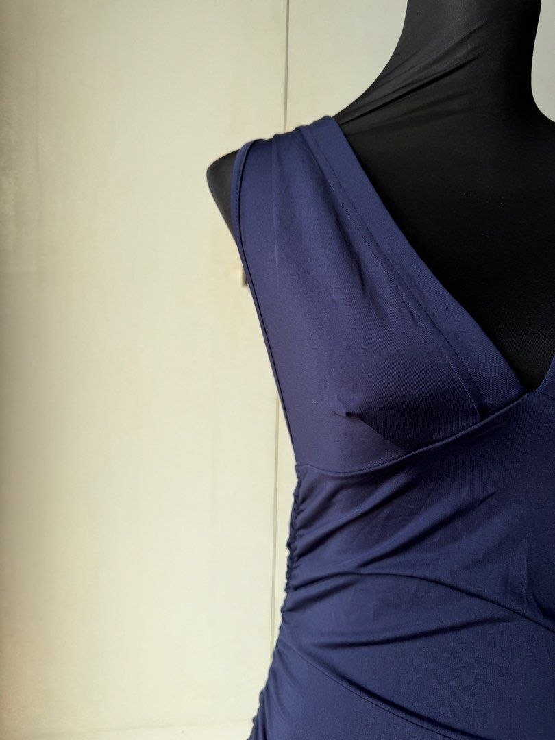 Navy Blue Sleeveless Top (Category: Sleeveless) located in Taytay. Submitted by stph_declutters (Listing ID 1437914657, Image 3). Description: - Navy blue sleeveless top - Flattering V-neckline - Ruched detailing on sides - Unique back strap design - Made of soft, stretchy material - Form-fitting style MOP: 🧾Gcash / Maya / Maribank / Bank Transfer MOD: 🚚LalaMove / Ggx / Grab 📍Taytay, Rizal 📍Manila .
