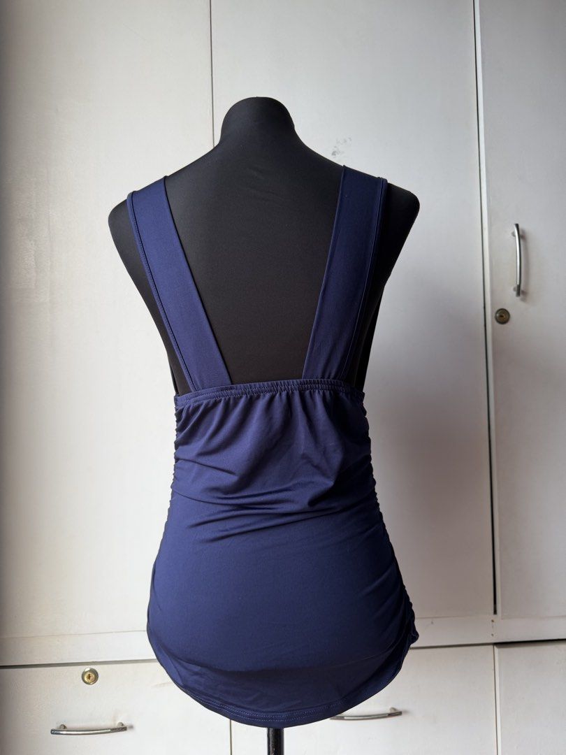 Navy Blue Sleeveless Top (Category: Sleeveless) located in Taytay. Submitted by stph_declutters (Listing ID 1437914657, Image 2). Description: - Navy blue sleeveless top - Flattering V-neckline - Ruched detailing on sides - Unique back strap design - Made of soft, stretchy material - Form-fitting style MOP: 🧾Gcash / Maya / Maribank / Bank Transfer MOD: 🚚LalaMove / Ggx / Grab 📍Taytay, Rizal 📍Manila .