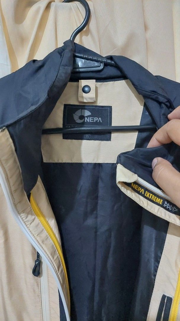 Hiking NEPA Extreme Jacket - Beige and Black (Category: Coats, Jackets and Outerwear) located in Governor Generoso. Submitted by cma_rarefitph (Listing ID 1437766324, Image 2). Description: - NEPA Extreme jacket - Color: Beige and black - Size: M (95) - Features: - Multiple zippered pockets - Full-length zipper - Hood - NEPA logo present.