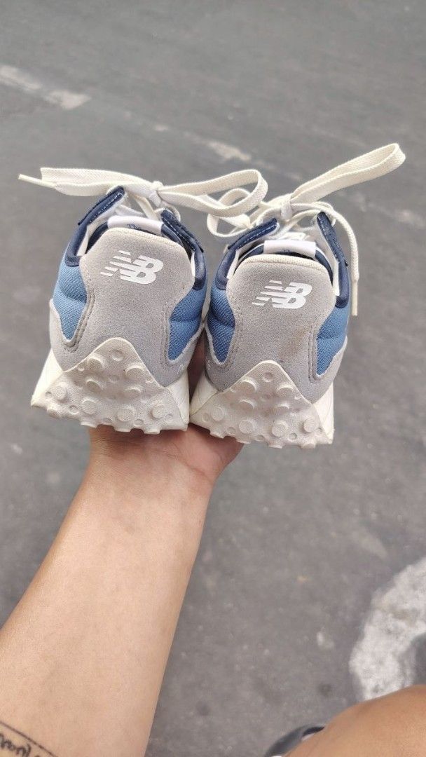 New Balance 327 Blue Sneakers (Category: Sneakers) located in Manila. Submitted by fheyyy_02 (Listing ID 1437879368, Image 3). Description: New Balance 327 sneakers in blue and white. Features the iconic New Balance logo on the side and tongue. The shoes have a blue and white color scheme with a suede and mesh upper. The soles are white with a textured pattern. The size is US 6.5, UK 4, EUR 37..