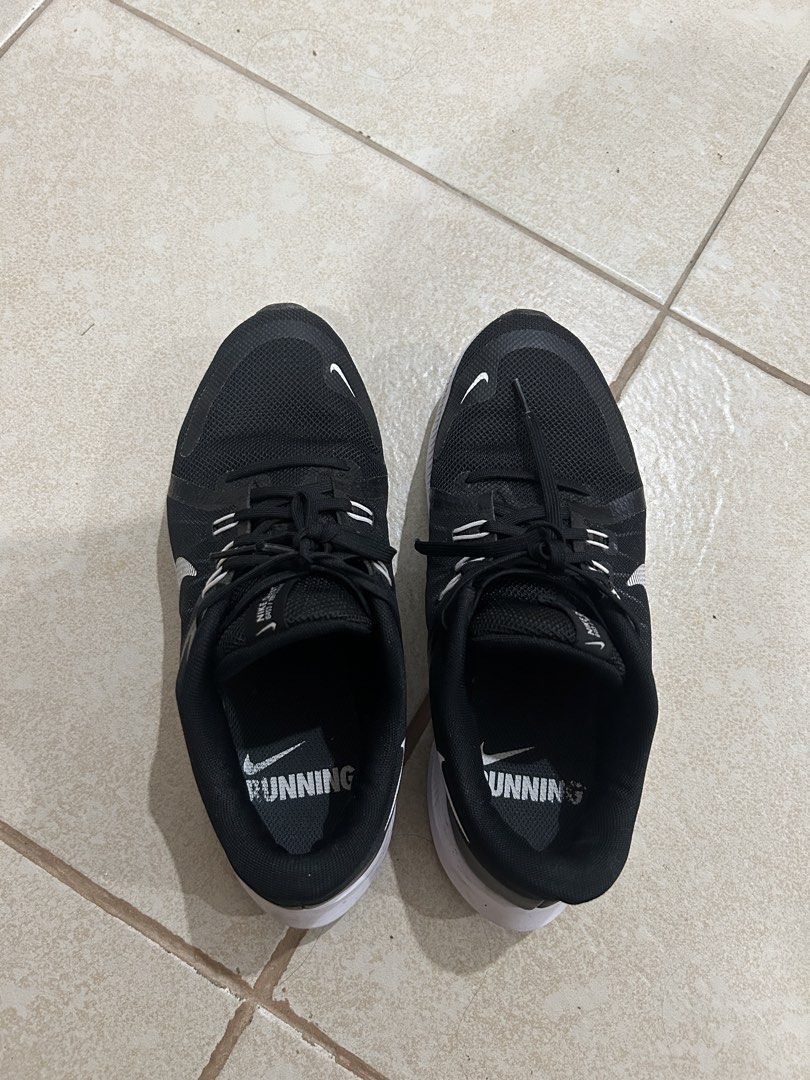 Nike Downshifter 11 Black Running Shoes (Category: Sneakers) located in Calamba. Submitted by jullalopez (Listing ID 1437927739, Image 2). Description: - Nike Downshifter 11 - Black colorway - White sole with Nike swoosh - 'RUNNING' detail on sole and insole - Mesh upper - Black laces - Suitable for running or casual wear.