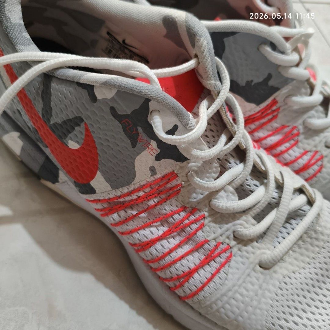 Nike Free Trainer 3.0 V2 Camo Sneakers (Category: Sneakers) located in Bulacan. Submitted by js.thriftstore (Listing ID 1437793532, Image 3). Description: - Nike Free Trainer 3.0 V2 - Camo design - Color: White and Red - Nike swoosh logo - Mesh upper - Flexible sole - Size: US 9.5, UK 8.5, EUR 43, 27.5 cm - Made in Vietnam.