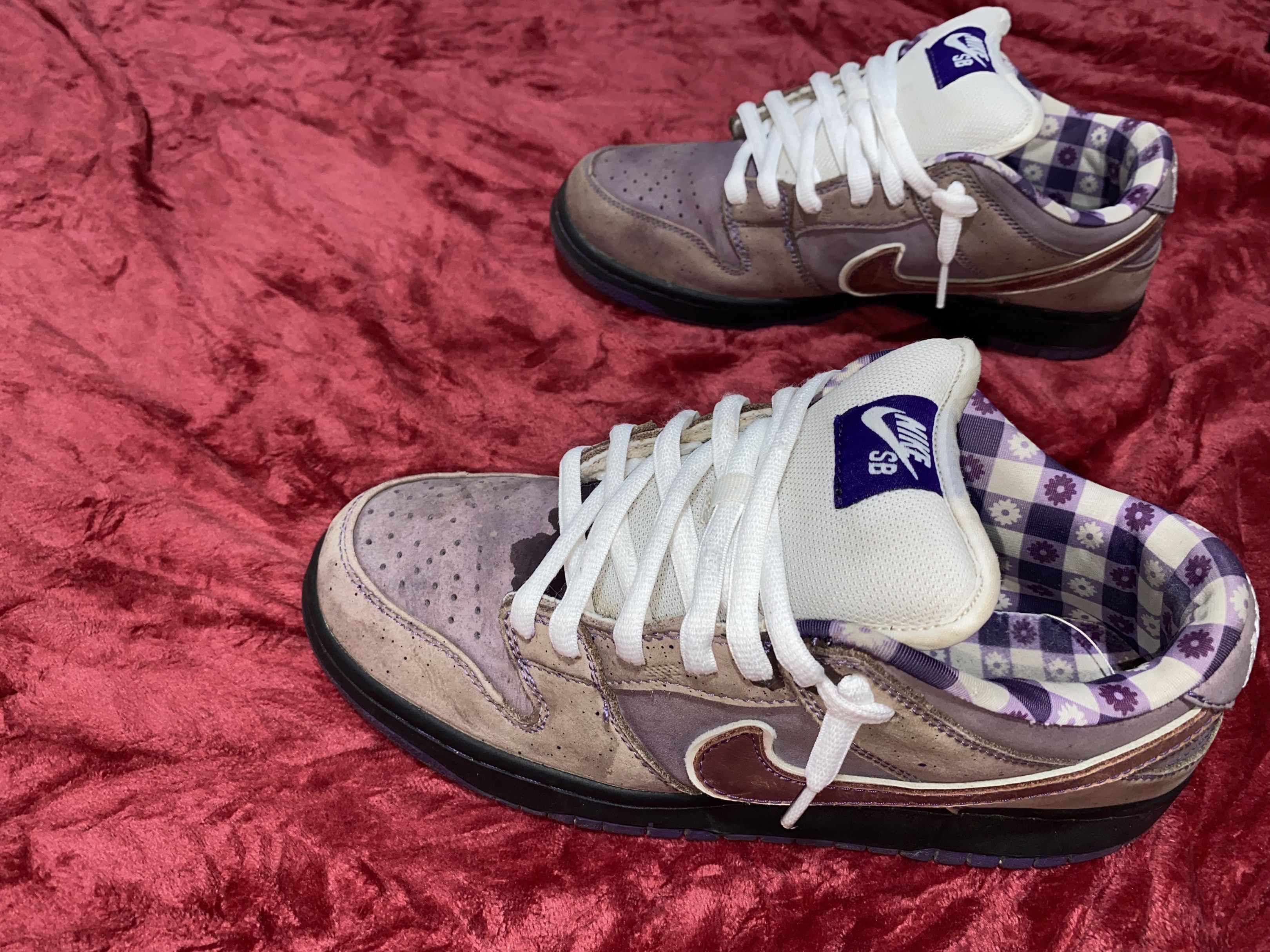 Nike SB Dunk Low (Purple Lobster) (Category: Sneakers) located in Iloilo. Submitted by maryne (Listing ID 1437778462, Image 2). Description: - Nike SB Dunk Low sneakers - Purple - White laces - Floral pattern on inner lining - Nike SB logo on tongue - Black sole - Purple swoosh.