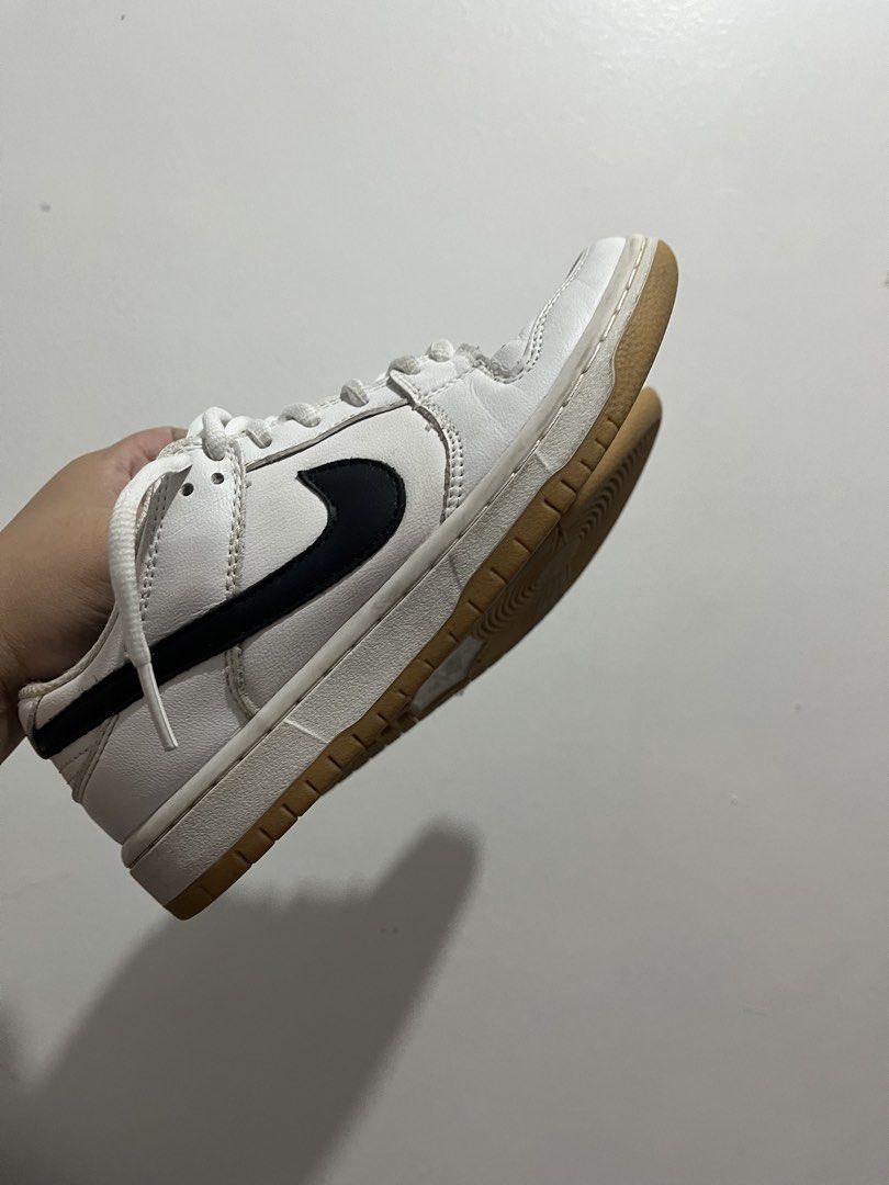Nike SB Dunk Low White Black (Category: Sneakers) located in Manila. Submitted by chinieannjocel (Listing ID 1437794101, Image 2). Description: RUSH SELL! - White Nike SB Dunk Low - Black swoosh - White laces - Perforated toe box - Nike SB logo on tongue - Clean and ready to wear - Some wear on soles.