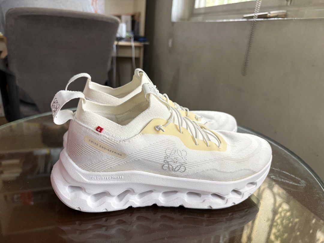 On Running Cloudtilt LOEWE All White (Category: Sneakers) located in Pasay City. Submitted by enzopeco (Listing ID 1437842556, Image 1). Description: On Running Cloudtilt LOEWE All White Size US 8 Womens 8.8/10 condition No box Issue: Slight yellowing 13,000 pesos PM for more inquiries.