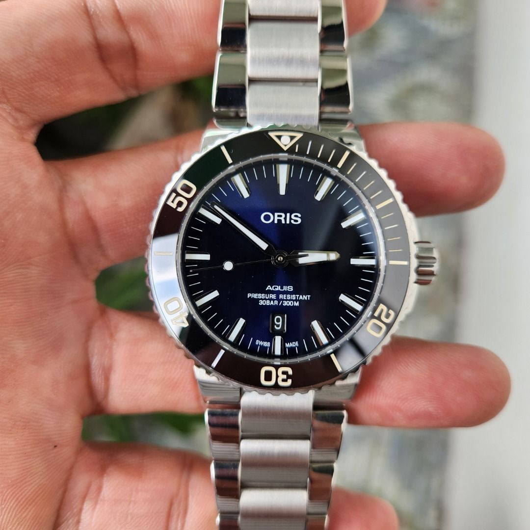 Oris Aquis Date Ceramic Bezel in Blue Dial 43.5mm - Complete Set (Category: Luxury Watches) located in Valenzuela. Submitted by royalvoguemanila (Listing ID 1437917206, Image 3). Description: Model/Ref：01 733 7730 4135-07 8 24 05PEB Movement： Automatic Size：43.5mm Inclusions: Unit, Double Box, Manual and Warranty Card, Extra Links, Aftermarket Brand New Rubber Strap Mall SRP: 165,000php Our Price: 58,000php ☑️ Authentic and legit timepieces ☑️ 3-