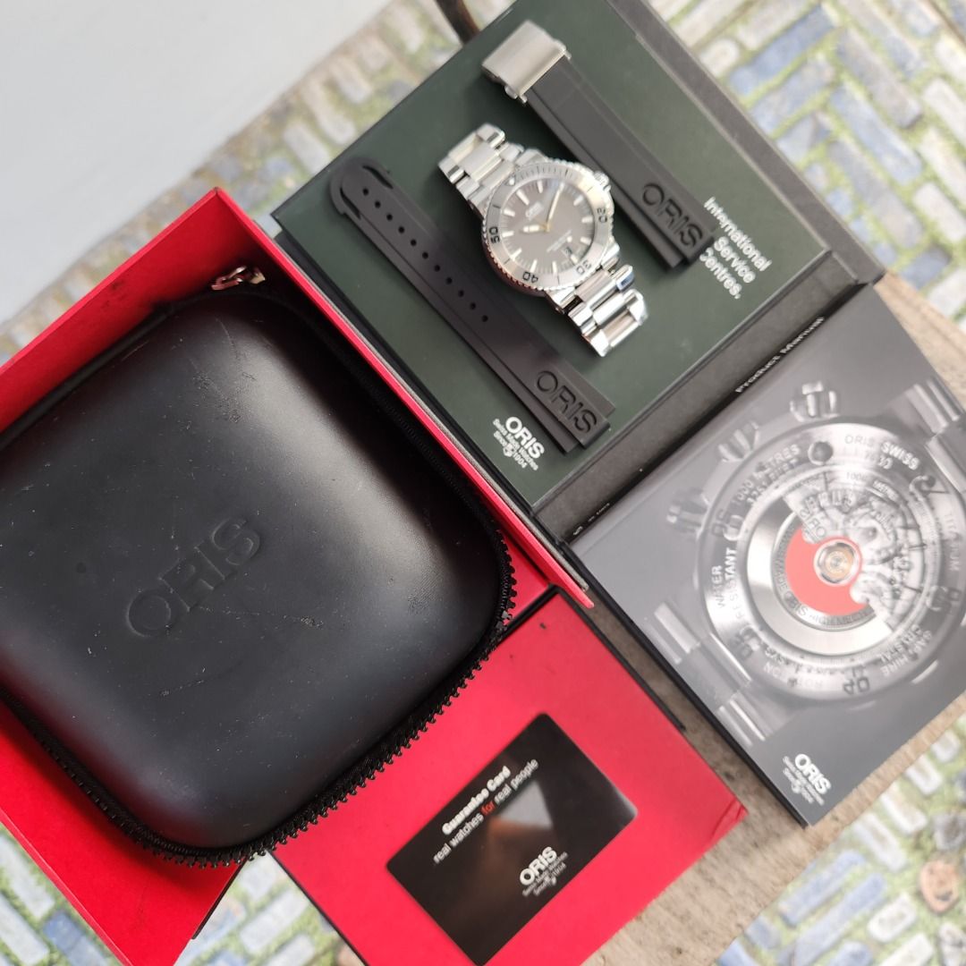 Oris Aquis Date Ceramic Bezel in Grey Dial 43mm - Complete Set (Category: Luxury Watches) located in Valenzuela. Submitted by royalvoguemanila (Listing ID 1437918134, Image 2). Description: Model/Ref：01 733 7653 4153-07 8 26 01PEB Movement： Automatic Size：43mm Inclusions: Unit, Double Box, Manual and Warranty Card, Extra Links, Extra Rubber Strap Mall SRP: 152,000php Our Price: 58,000php ☑️ Authentic and legit timepieces ☑️ 3-months shop warranty