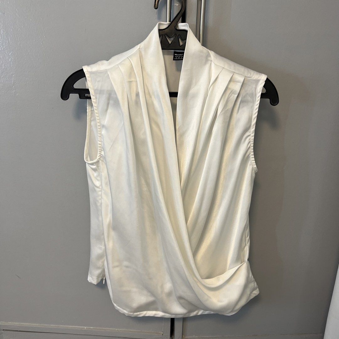Overlap White Sleeveless Top | pinterest y2k (Category: Sleeveless) located in Caloocan City. Submitted by stargy4l (Listing ID 1437936481, Image 2). Description: - Moosta+ white sleeveless top - Wrap design - Size S (EU US 36/4) - Made in China - Smooth, silky texture - Dress up or down.