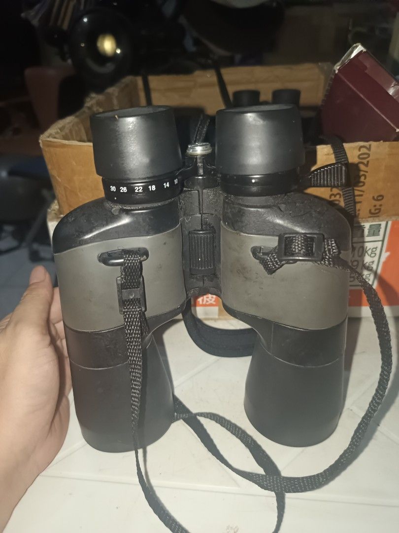 Panda 10x-30x50 mm Binoculars (Category: Lens & Kits) located in Cebu City. Submitted by turuuru8992423 (Listing ID 1437849719, Image 2). Description: Panda 10x-30x50mm Zoom Binoculars Description: Selling these Panda brand zoom binoculars. Great for general viewing, bird watching, or outdoor use. The body shows some signs of use but is solid and comes with the neck strap attached as seen in the images. Condition & Functionality: Optics: Clear le