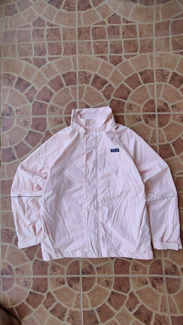Patagonia Pink Jacket with Hood (Category: Coats, Jackets and Outerwear) located in Manila. Submitted by thriftafinds (Listing ID 1437908164, Image 2). Description: - Patagonia pink jacket - Size: M - Features a hood and full-length zipper - Small Patagonia logo on chest - Interior: Light pink mesh - Made in Sri Lanka.