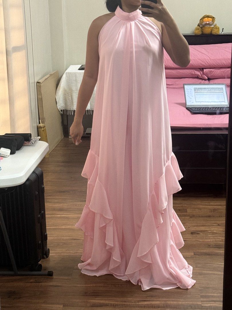 Pink Halter Neck Ruffle Maxi Dress (Category: Evening dresses & gowns) located in Quezon City. Submitted by bettina_ (Listing ID 1437891814, Image 1). Description: Custom pink halter maxi gown from Adora Couture Bought for P6,000 RFS: Spare bridesmaid gown and never been used Rent for P500 per day Buy for P3,000.