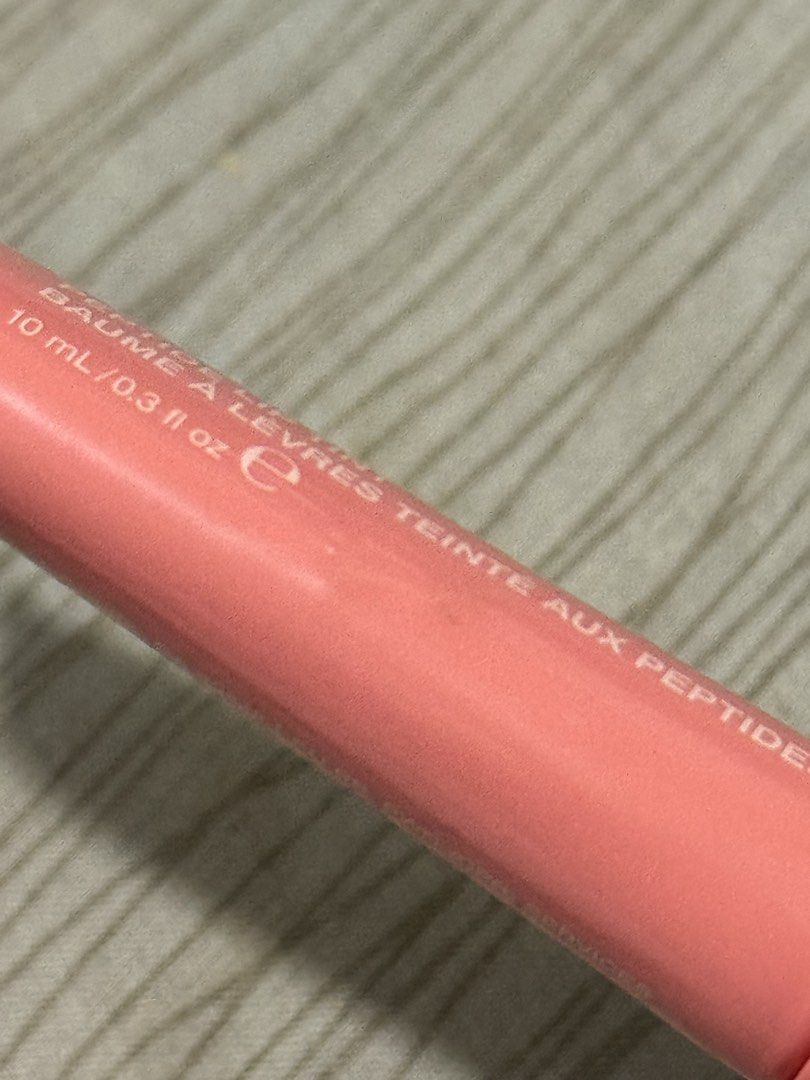 Rhode Peptide Lip Tint - Peach Pit (Category: Makeup) located in Victoria. Submitted by gcel01 (Listing ID 1437918996, Image 3). Description: - Rhode Peptide Lip Tint in Peach Pit - About 50% full - Rfs: too many Rhode lippie .