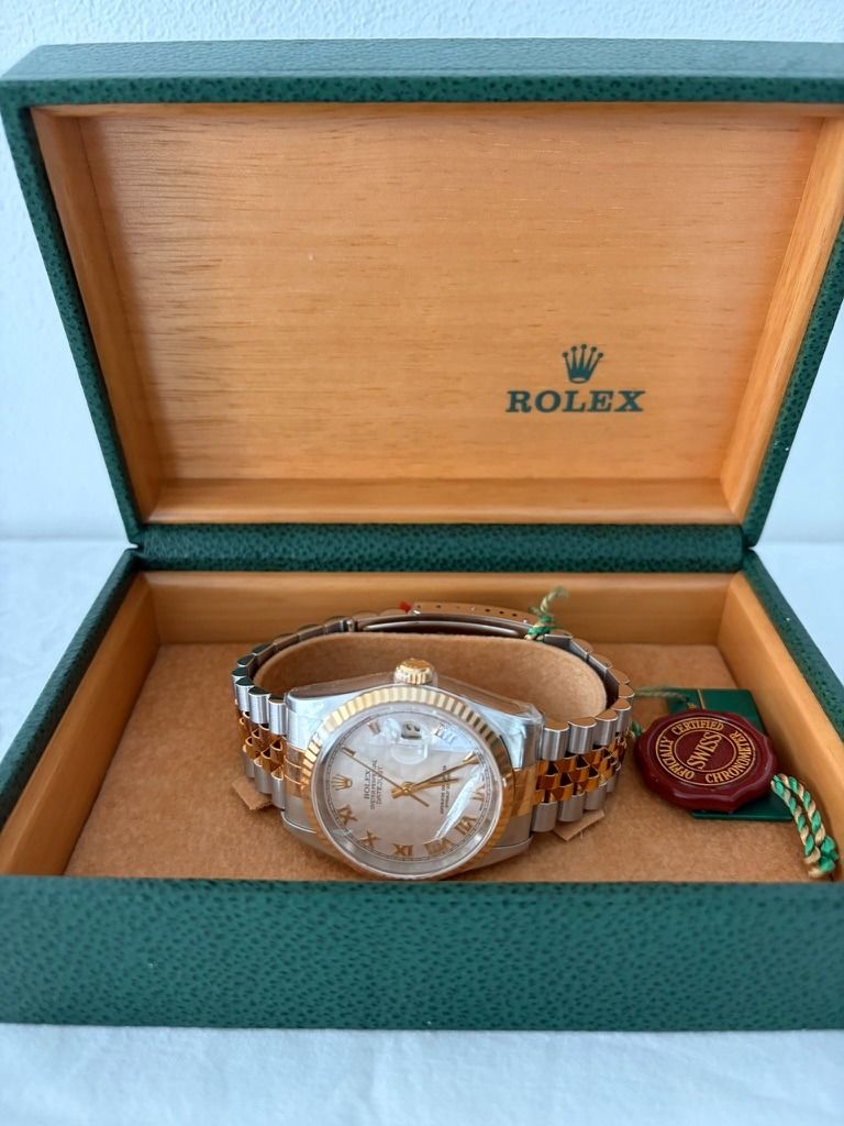Rolex Datejust Two-Tone Watch Brand New (Category: Luxury Watches) located in Manila. Submitted by paolohernandez28 (Listing ID 1437808802, Image 1). Description: Selling my Rolex Datejust 36 in two-tone steel and 18k yellow gold. Classic fluted bezel, Jubilee bracelet, and the ivory pyramid Roman numeral dial. DETAILS • Model: Datejust 36mm • Case: Stainless steel + 18k yellow gold • Bezel: Fluted 18k yellow gold • Dial: Ivory pyramid Roman nume
