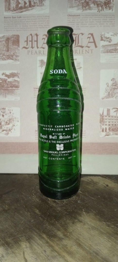 Royal Soda Green Bottle (Category: Water Bottles & Tumblers) located in Manila. Submitted by iamrich110502 (Listing ID 1437840952, Image 2). Description: - Vintage Royal Soda bottle - Features a green glass bottle - Includes the original Royal Soda label - Label reads "Sparkling Soda" - Text on the back of the bottle - Perfect for soda enthusiasts and vintage bottle collectors.
