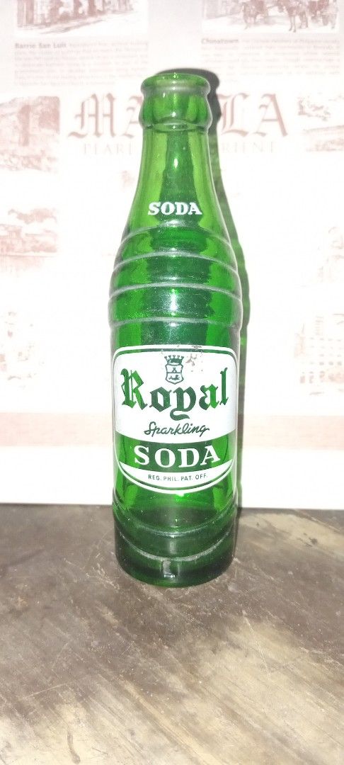 Royal Soda Green Bottle (Category: Water Bottles & Tumblers) located in Manila. Submitted by iamrich110502 (Listing ID 1437840952, Image 1). Description: - Vintage Royal Soda bottle - Features a green glass bottle - Includes the original Royal Soda label - Label reads "Sparkling Soda" - Text on the back of the bottle - Perfect for soda enthusiasts and vintage bottle collectors.