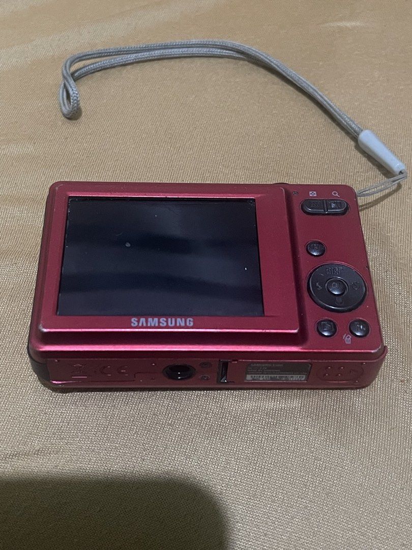 Samsung Digital Camera 12.2MP (Category: Cameras) located in Baguio. Submitted by beygyuu (Listing ID 1437925667, Image 2). Description: - Red Samsung digital camera - 12.2 megapixel resolution - 3x zoom lens - Built-in flash - Screen on the back - Includes wrist strap.