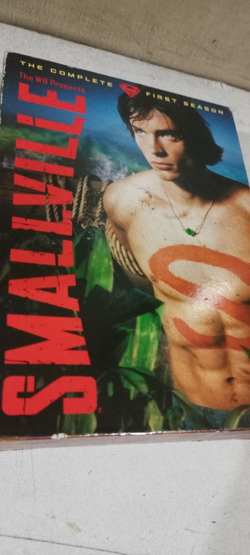Smallville: The Complete First Season DVD (Category: CDs & DVDs) located in Manila. Submitted by jeannetteyago (Listing ID 1437890598, Image 1). Description: - Smallville: The Complete First Season on DVD - Includes all 22 episodes (4 discs) - Starring Tom Welling as Clark Kent - Warner Bros. release - Features special features - Original cover art.