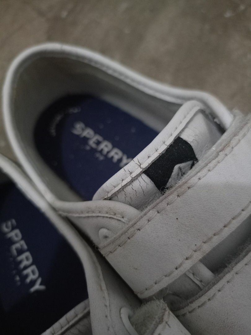 Sperry White Velcro Shoes (Category: Sneakers) located in Cebu City. Submitted by maxs.things (Listing ID 1437862141, Image 3). Description: - White Sperry shoes - Velcro straps - Navy blue insole with Sperry logo - Textured soles - Pre-owned condition - Visible wear and tear.