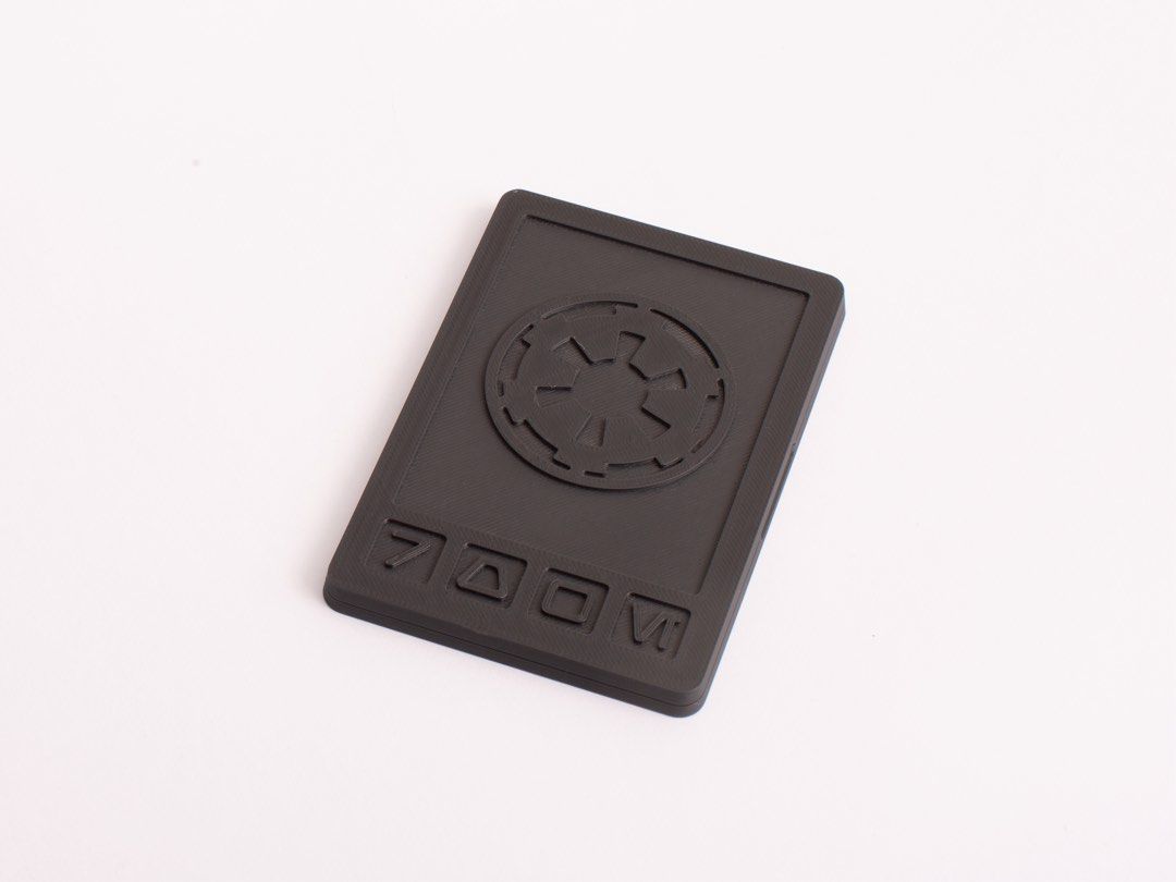Star Wars Imperial Credit Card (Category: Raw Singles) located in Manila. Submitted by atoyzky (Listing ID 1437919479, Image 2). Description: - Star Wars Imperial Credit Card - Features the Imperial symbol - Black plastic design - Collectible item - Ideal for Star Wars enthusiasts.