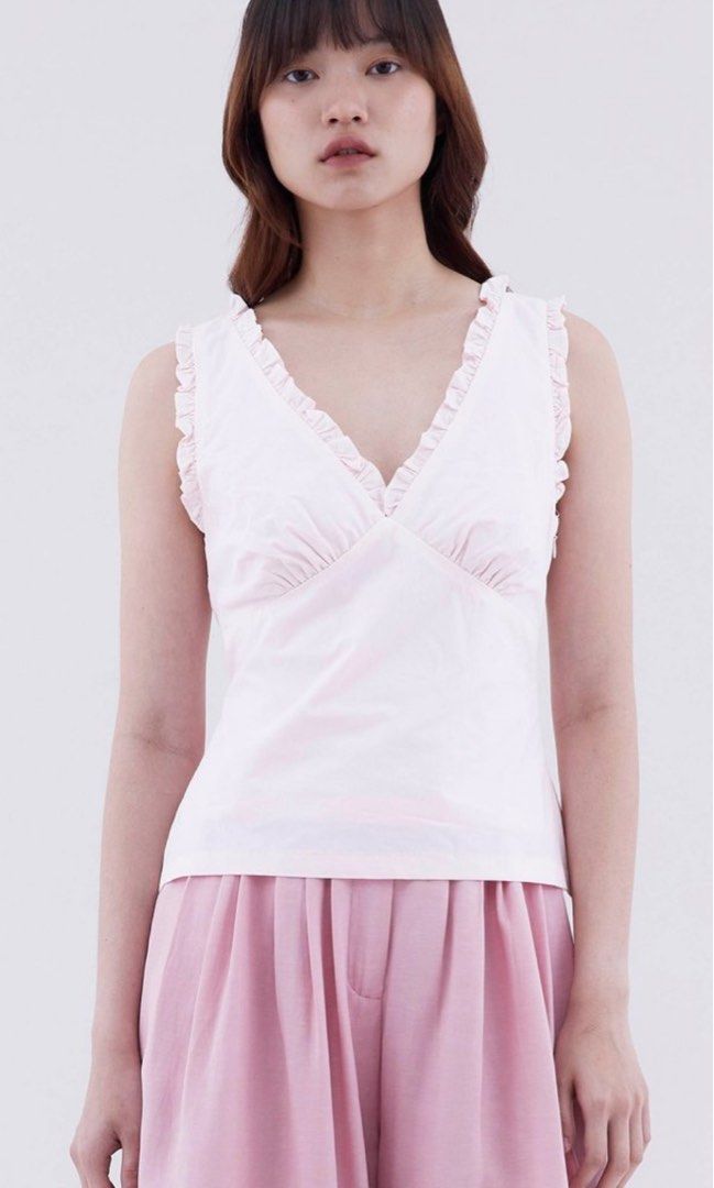 The Editor's Market Pink Ruffle Top (Category: Sleeveless) located in Las Pinas. Submitted by winteeer (Listing ID 1437841158, Image 1). Description: 1pc 2000 2pcs 1925 3pcs 1950 MEASUREMENTS BUST 34 LENGTH 21.5.