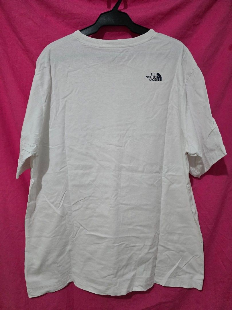 The North Face White T-shirt (Category: Tshirts & Polo Shirts ) located in Quezon City. Submitted by smallblackant (Listing ID 1437800110, Image 3). Description: - The North Face t-shirt - Color: White - Features a large logo on the front with "Never Stop Exploring Since 1966" - Small logo on the back - Size: US XL / Asia XXL - Made in China 23.5 X 30 sf c/o buyer.