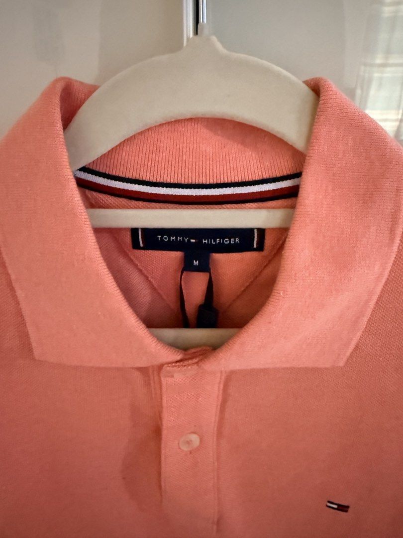 Tommy Hilfiger Polo Shirt (Category: Shirts) located in San Pedro. Submitted by chichingscloset (Listing ID 1437792936, Image 2). Description: ❤️Tommy Hilfiger polo shirts are known for their classic, clean, and sporty style. They are usually made from soft cotton or cotton-blend fabric with a comfortable fit suitable for casual wear or smart-casual occasions. ❤️Size: Medium on Tag ❤️Measurement: 19.5x 27.5 inches ❤️Brand new ❤️Unisex.